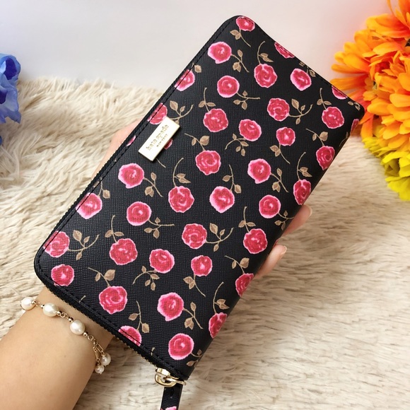 kate spade Handbags - NWT Kate Spade Laurel Way Hazy Rose Neda Wallet